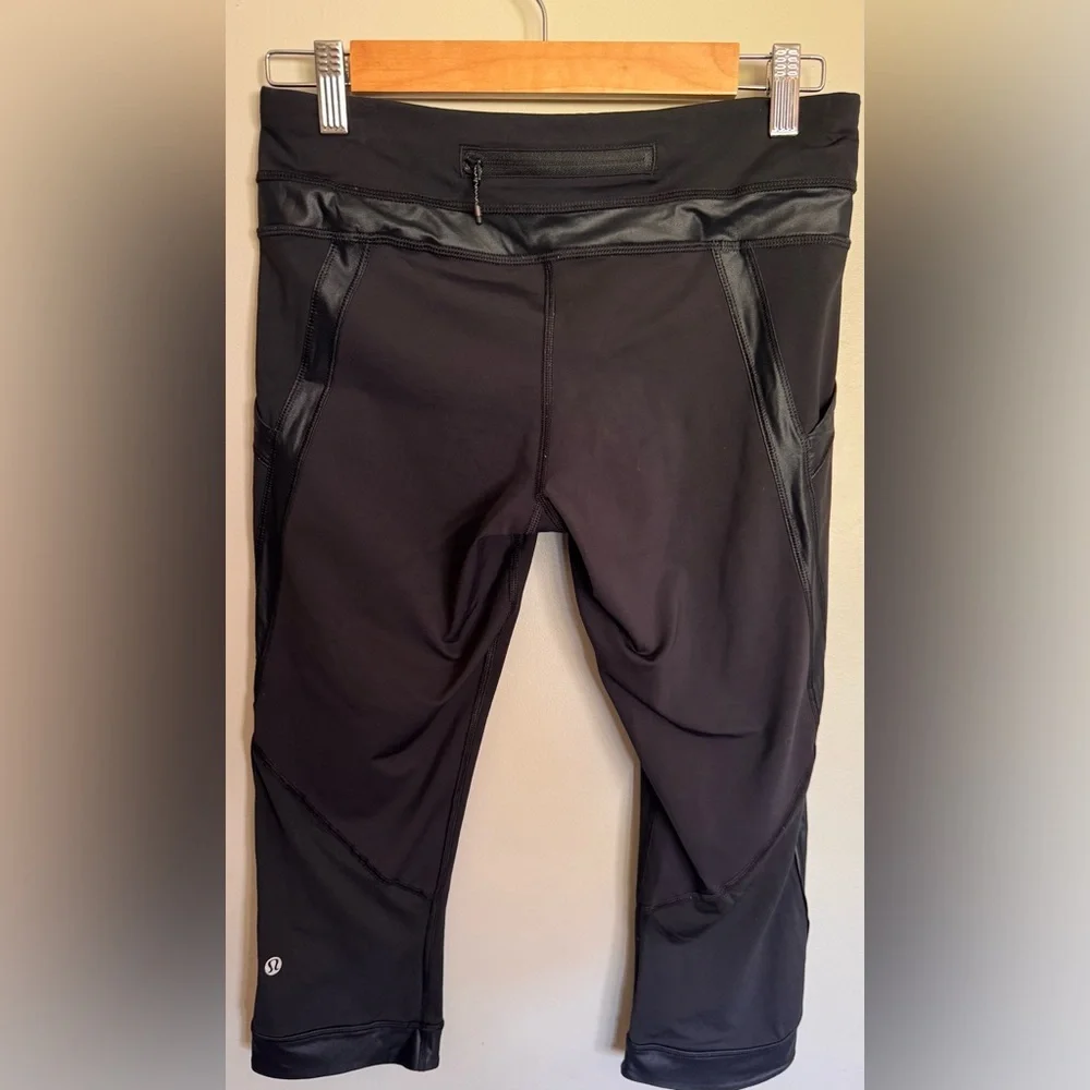 Lululemon Black Crop Leggings Size 8 Faux Leather Trim Zip Pocket Athletic